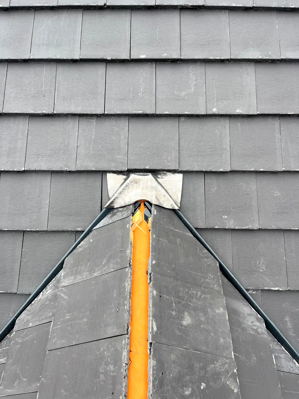 Slate apex with hand-dressed leadwork